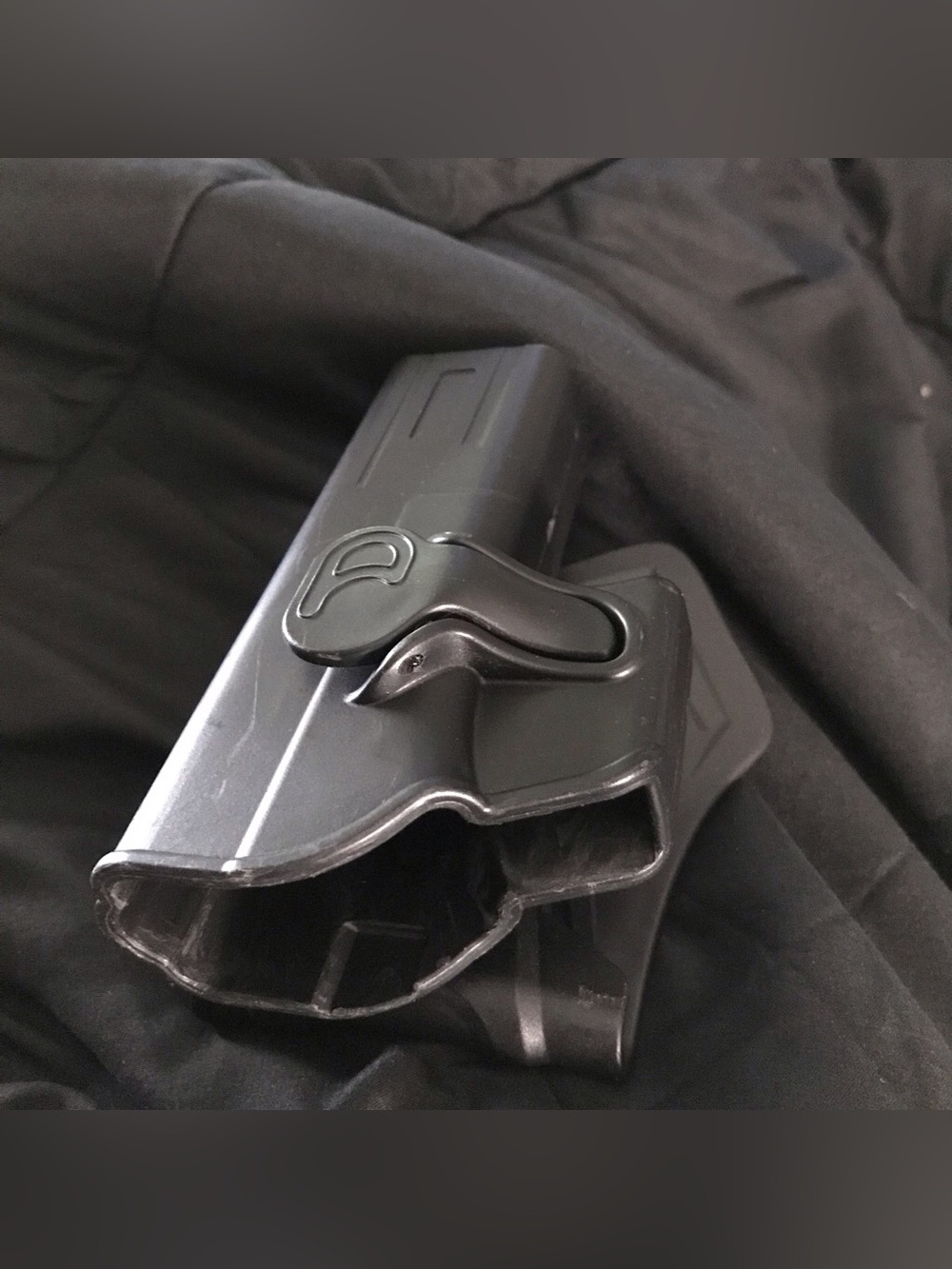 Black OWB Glock 21 paddle holster